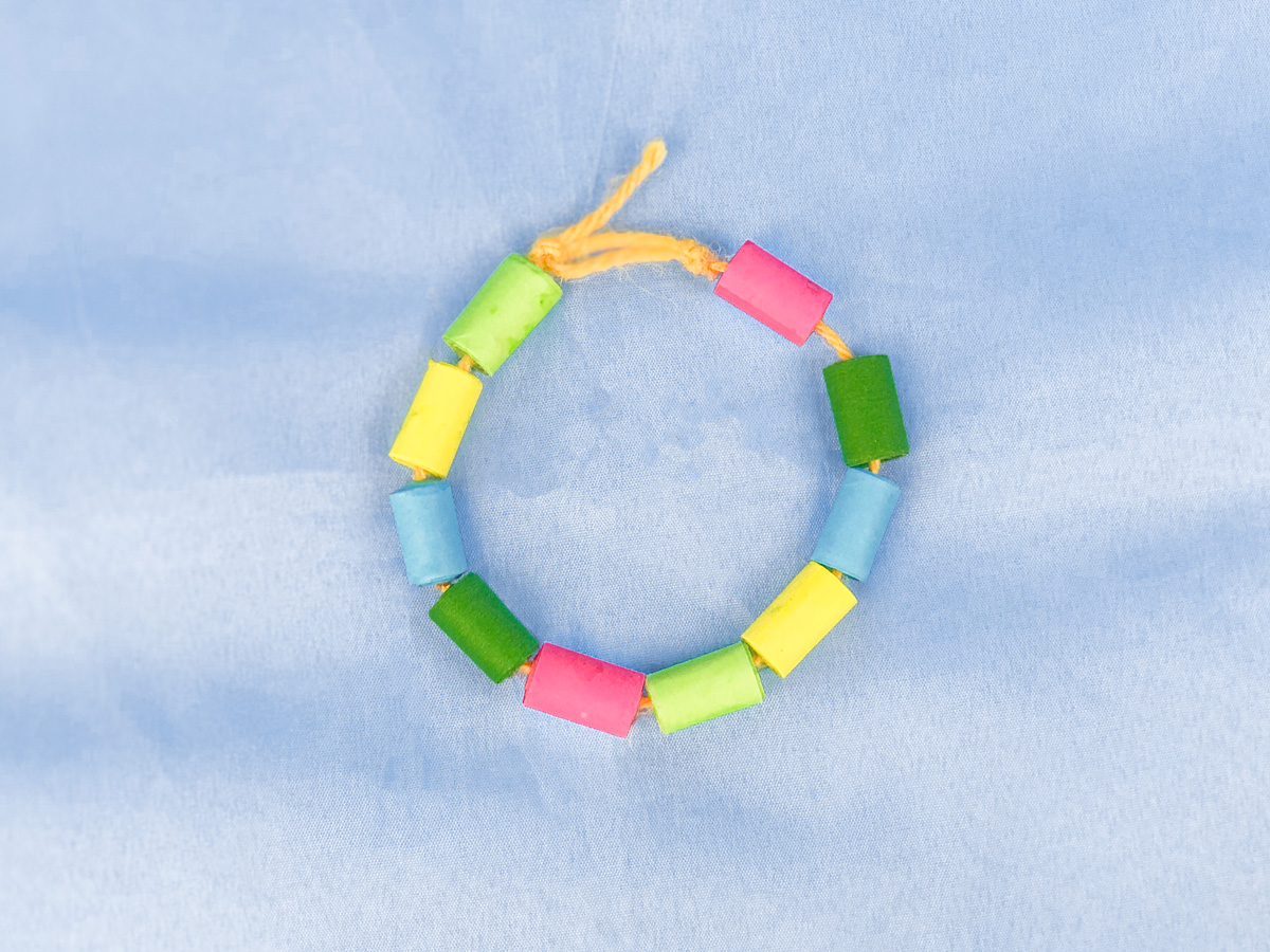 Paper bead bracelets feature