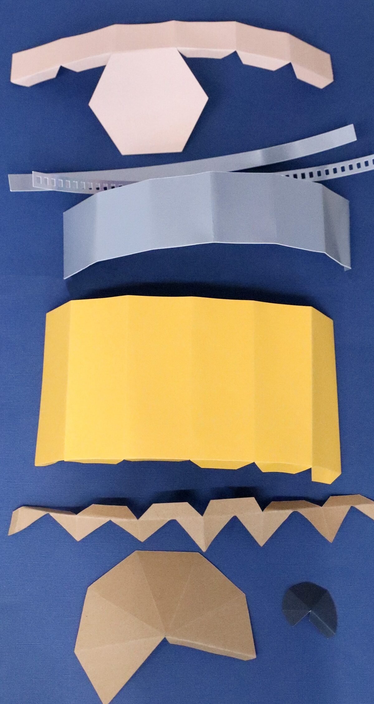 folded paper pieces on the scoring lines of the DIY Paper Pencil Box 