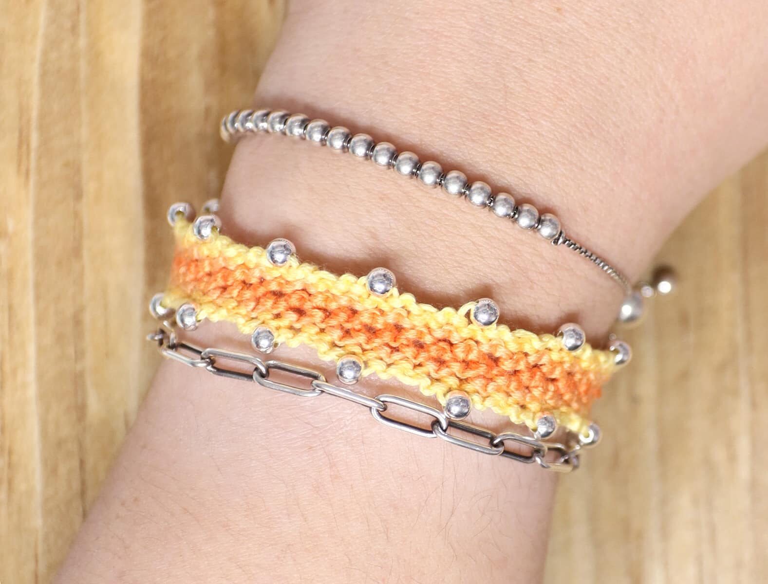 detailed shot of beads on the friendship bracelet